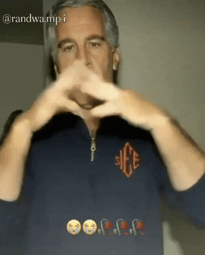 A Man Making A Heart Shape With His Hands With The Words Randwa.mp4 Written Below Him GIF