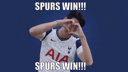 A Man Making A Heart With His Hands And The Words Spurs Win GIF