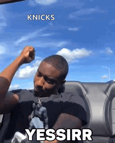 A Man On A Boat With The Words Knicks Yessirr Written On The Bottom GIF