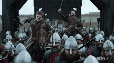 A Man On A Horse Is Surrounded By Soldiers With Netflix Written On The Bottom GIF