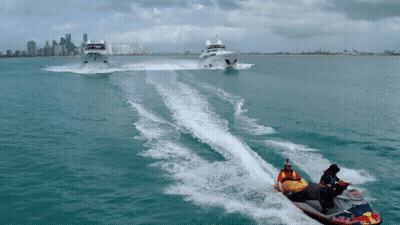 A Man On A Jet Ski That Says Red Bull GIF