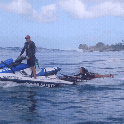A Man On A Jet Ski With The Word Ocean Safety On It GIF