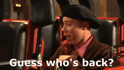 A Man On A Roller Coaster With The Words Guess Who 'S Back GIF