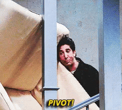 A Man Peeking Out From Behind A Couch With The Words " Pivot " Above Him GIF