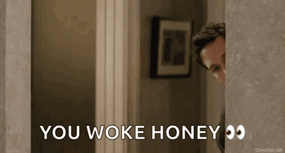 A Man Peeking Out From Behind A Door With The Words You Woke Honey Written On It GIF