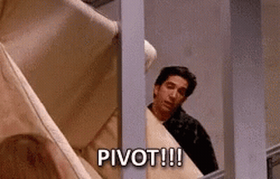 A Man Peeking Out Of A Window With The Words Pivot !!! Above Him GIF
