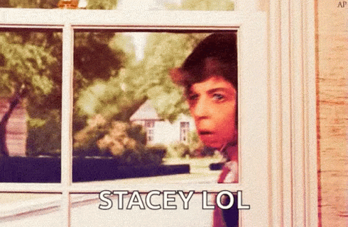 A Man Peeking Out Of A Window With The Words Stacey Lol Written On The Bottom GIF