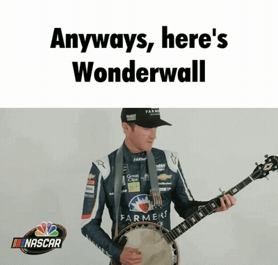 A Man Playing A Banjo With A Nascar Logo Behind Him GIF