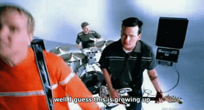 A Man Playing A Guitar In A Band With The Words Well I Guess This Is Growing Up GIF