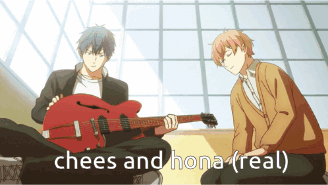 A Man Playing A Guitar Next To Another Man Who Says Chees And Hona GIF