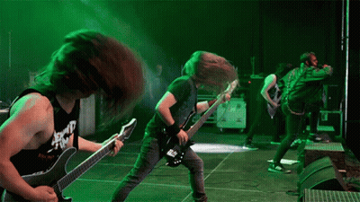A Man Playing A Guitar With A Shirt That Says ' Almost Gone ' On It GIF