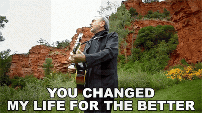 A Man Playing A Guitar With The Words You Changed My Life For The Better GIF