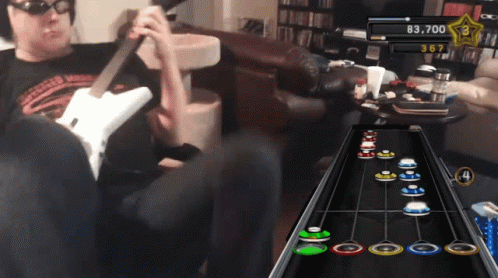 A Man Playing A Video Game With A Score Of 83,700 Points GIF