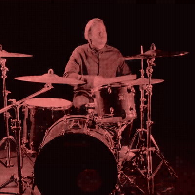 A Man Playing Drums With A Drum Set That Says Yamaha GIF