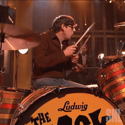 A Man Playing Drums With A Ludwig Drum Set GIF