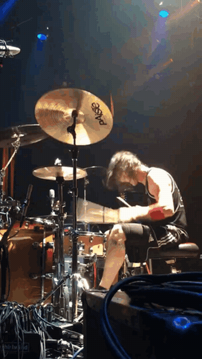 A Man Playing Drums With A Sabian Cymbal GIF