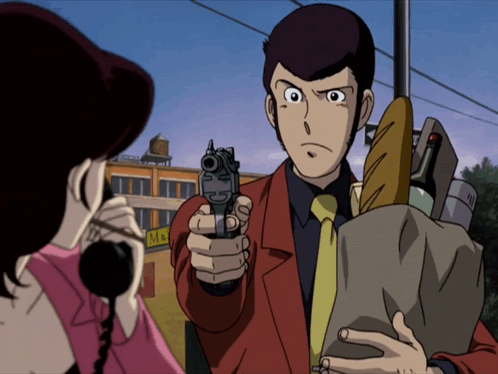 A Man Pointing A Gun At A Woman Holding A Bag Of Bread GIF