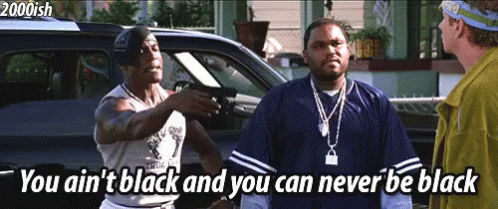 A Man Pointing A Gun At Another Man With The Words You Ain 'T Black And You Can Never Be Black GIF