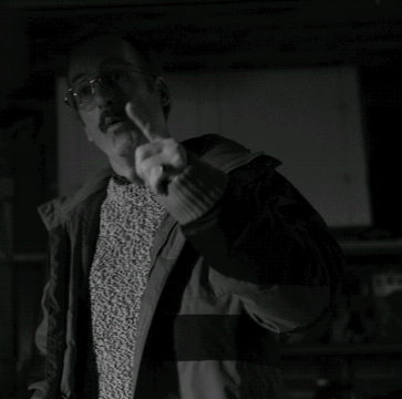 A Man Pointing At The Camera With The Words We 'Re Done Above Him GIF