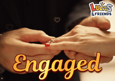 A Man Putting A Ring On A Woman 'S Finger With The Words Engaged Below GIF