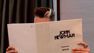 A Man Reads A Script For John Newman GIF