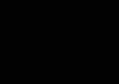 A Man Riding A Bike Down A Hill With A Red Bull Sign In The Background GIF