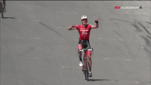 A Man Riding A Bike With The Word Trek On The Front GIF