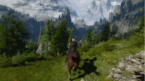 A Man Riding A Horse In The Mountains With A Castle In The Background GIF