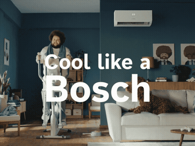 A Man Riding An Elliptical In A Living Room With The Words Cool Like A Bosch GIF