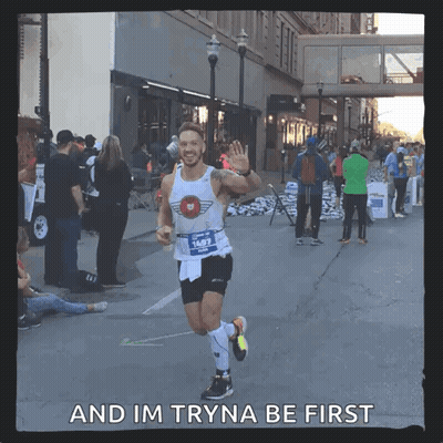 A Man Running A Marathon With The Words " And Im Tryna Be First " On The Bottom GIF