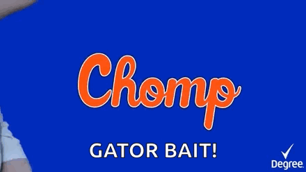 A Man 'S Arms Are Stretched Out In Front Of A Blue Background That Says " Champ Gator Bait Degree " GIF