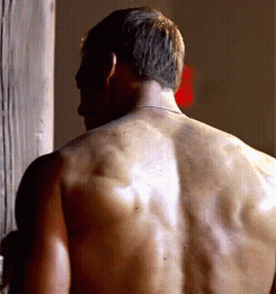 A Man 'S Back Is Shown In A Close Up GIF