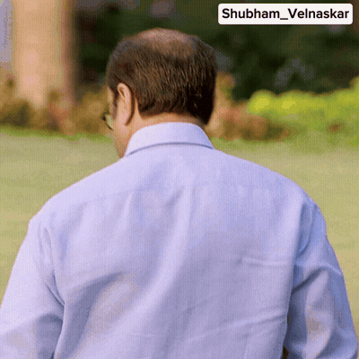 A Man 'S Back Is Shown With The Name Shubham Velnaskar On The Corner GIF
