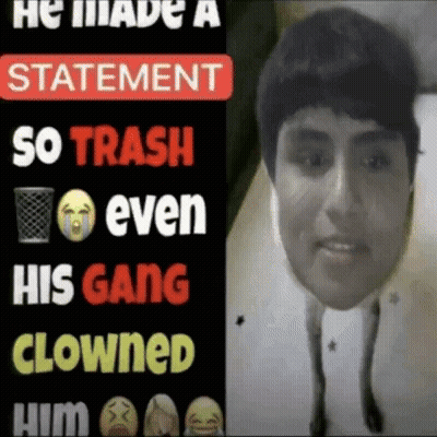 A Man 'S Face Is Behind A Sign That Says He Made A Statement So Trash Even His Gang Clowns Him GIF