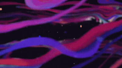 A Man 'S Face Is Glowing In A Purple And Blue Light GIF