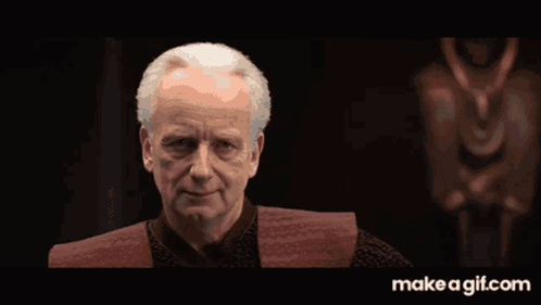 A Man 'S Face Is Shown In A Make A Gif.com Gif