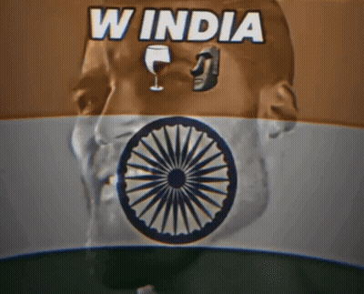 A Man 'S Head With A Wine Glass In His Mouth And The Words W India Above Him GIF