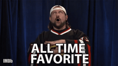 A Man Says All Time Favorite With His Hands Up In The Air GIF