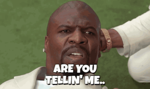A Man Says " Are You Tellin ' Me " In Front Of A Green Background GIF