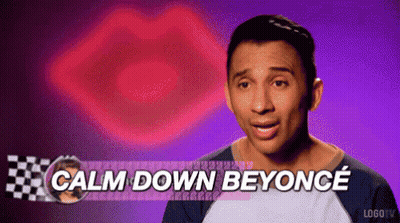 A Man Says Calm Down Beyonce In Front Of A Purple Background . GIF