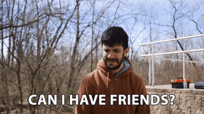 A Man Says " Can I Have Friends " In Front Of A Forest GIF
