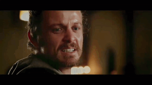 A Man Says " Cause That 'S Exactly What He Does " In A Dark Room GIF