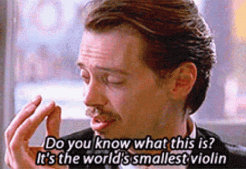 A Man Says Do You Know What This Is It 'S The World 'S Smallest Violin . GIF