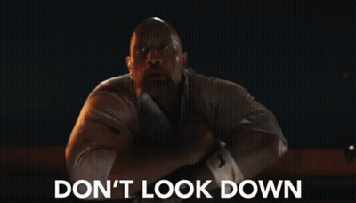 A Man Says " Don 'T Look Down " While Looking Down GIF