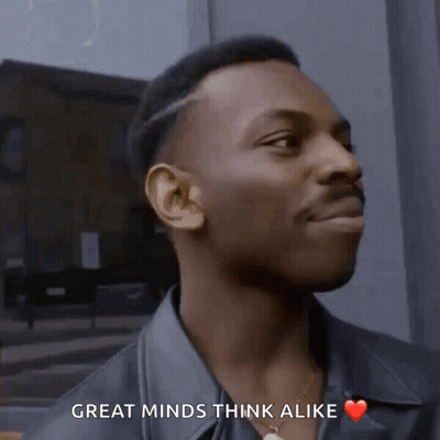 A Man Says Great Minds Think Alike And Has A Heart On His Chest GIF