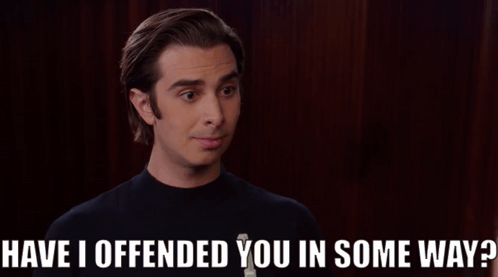 A Man Says " Have I Offended You In Some Way " In A Dark Room GIF