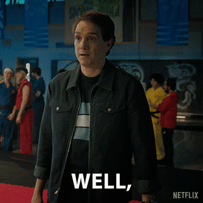 A Man Says Here We Go Again In Front Of A Crowd Of People GIF