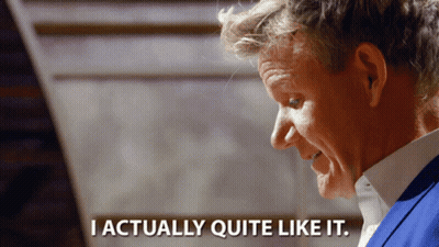 A Man Says I Actually Quite Like It In Front Of A Staircase GIF
