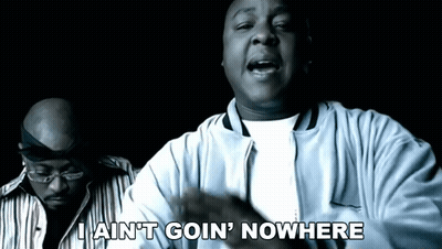 A Man Says I Ain 'T Goin ' Nowhere While Another Man Looks On GIF