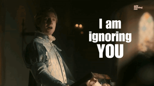 A Man Says I Am Ignoring You While Holding A Piece Of Paper GIF